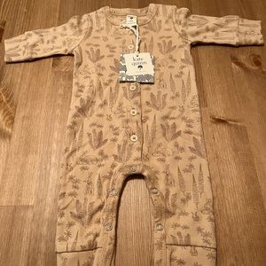 Nature-themed wheat colored one piece from Kate Quinn. Brand new w/ tags!